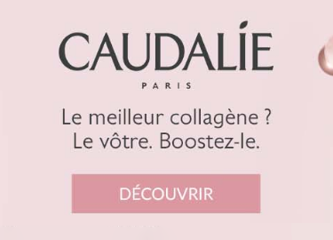 2 pots de Caudalie resveratrol-lift ouvert avec une grappe de raison rouge